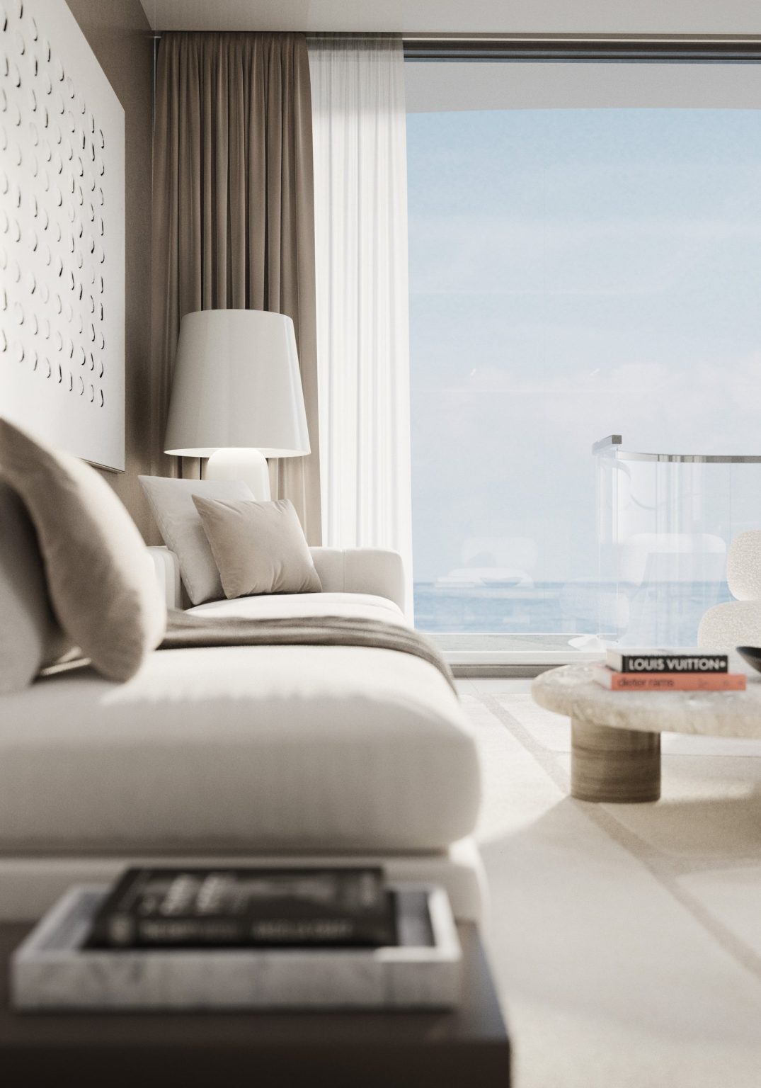 Living room detail with travertine finishes at Esmé Beach Residences