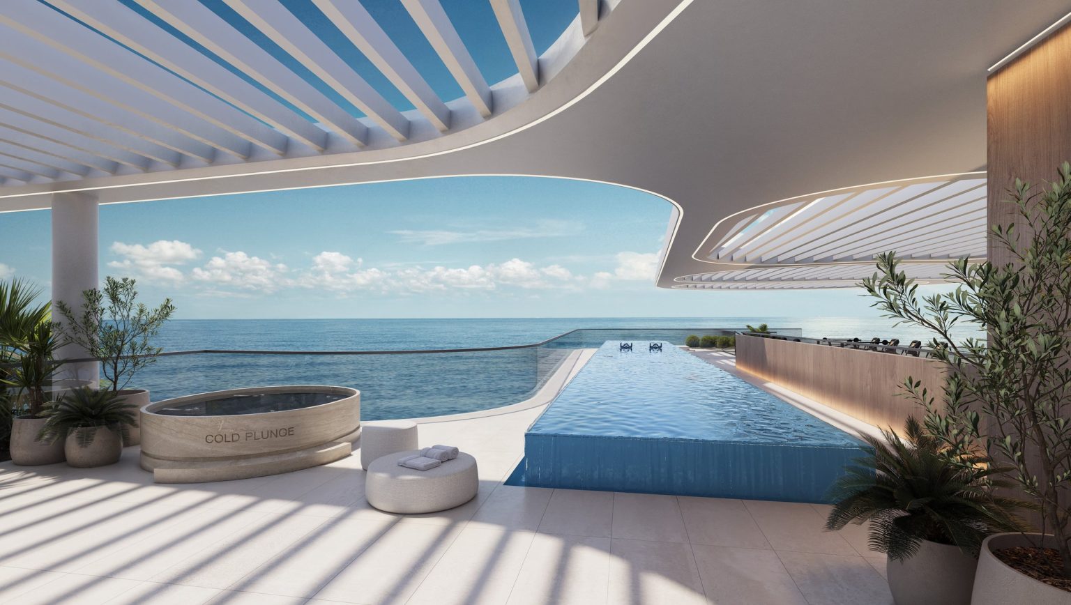 Rooftop lap pool and cold plunge overlooking the sea at Esmé Beach Residences